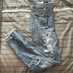 Distressed Blue Jeans